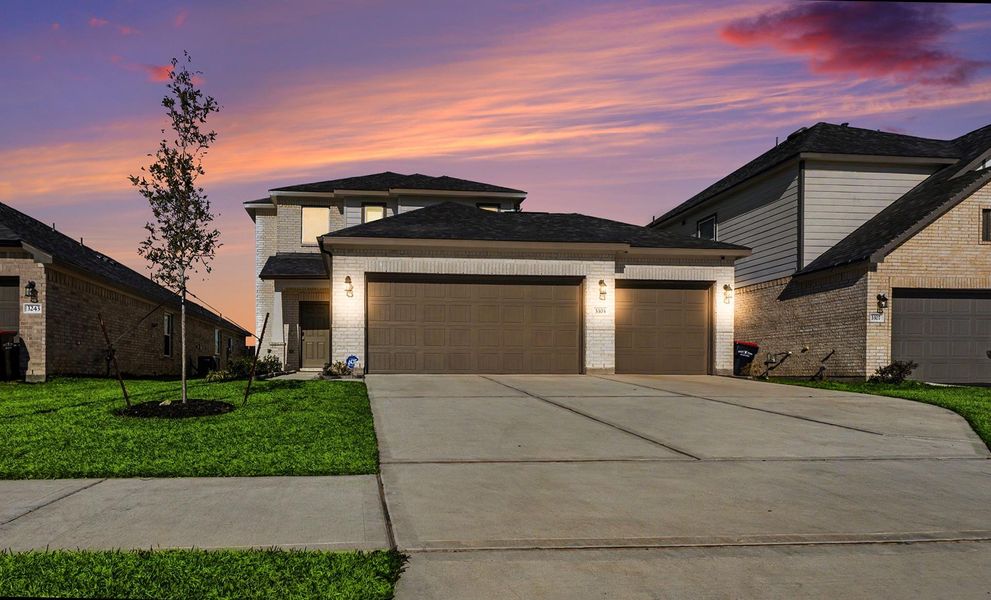 Front exterior of a new home in , Baytown, TX, highlighting curb appeal (Image 24).