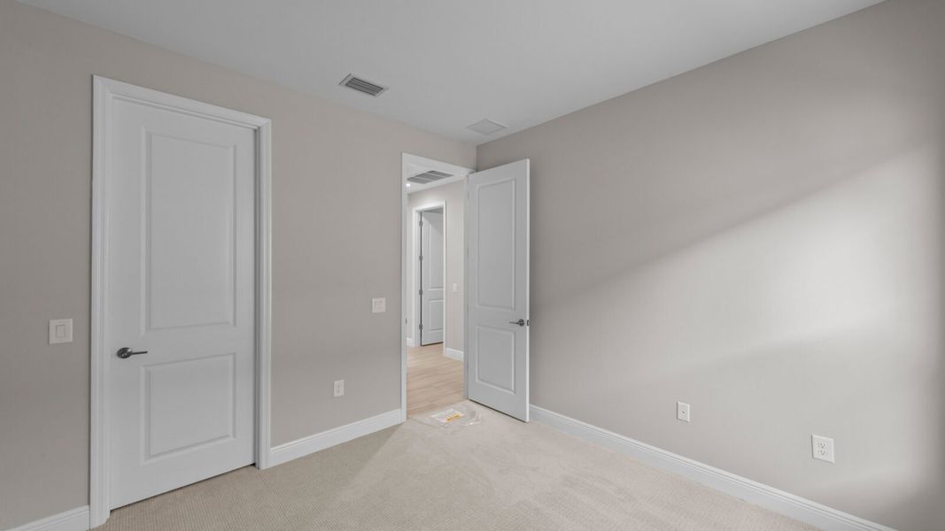 Spacious, unfurnished interior of a new home in SkySail, Naples (Image 22).