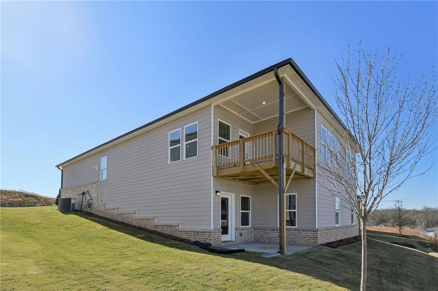 Exterior details and patio area of a home in Preserve at Mountain Creek, Pendergrass (Image 29).