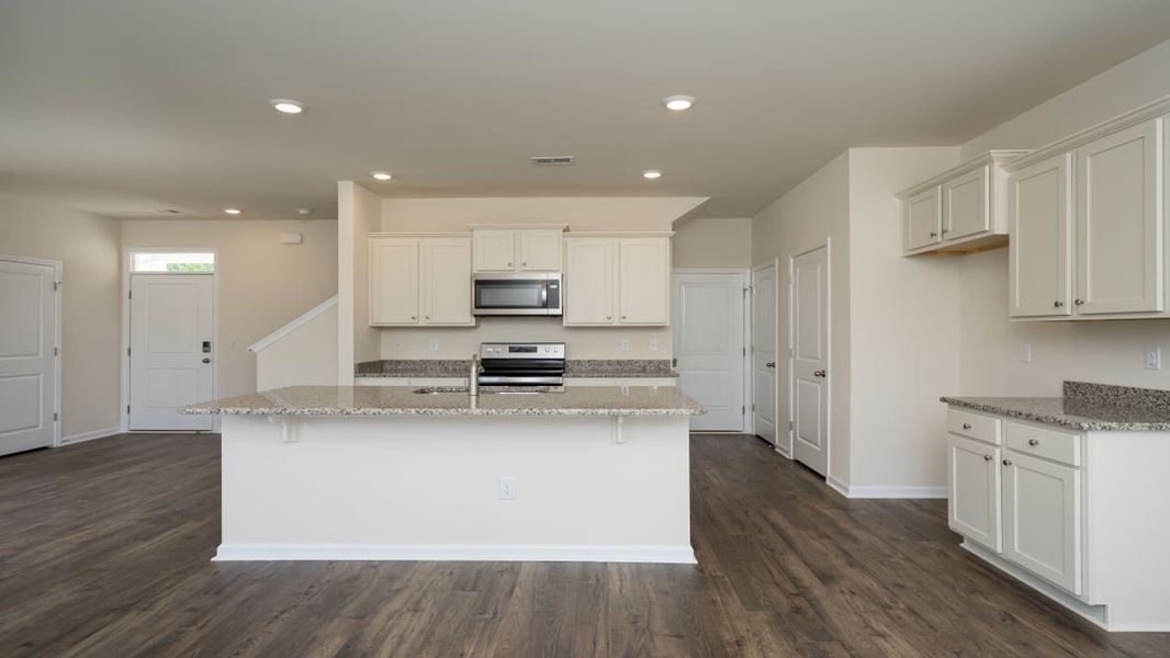 Furnished interior view inside a new home in The Pines at Blake Farm, Wilmington (Image 6).