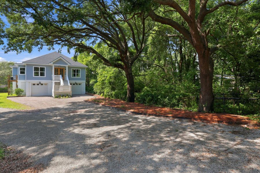 Front exterior of a new home in , Johns Island, SC, highlighting curb appeal (Image 22). Front exterior of a new home in , Johns Island, SC, highlighting curb appeal (Image 22).