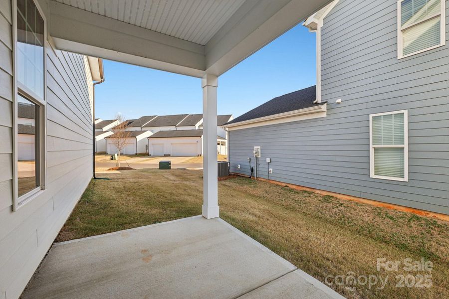 Exterior details and patio area of a home in Edgewood Preserve, Huntersville (Image 3).