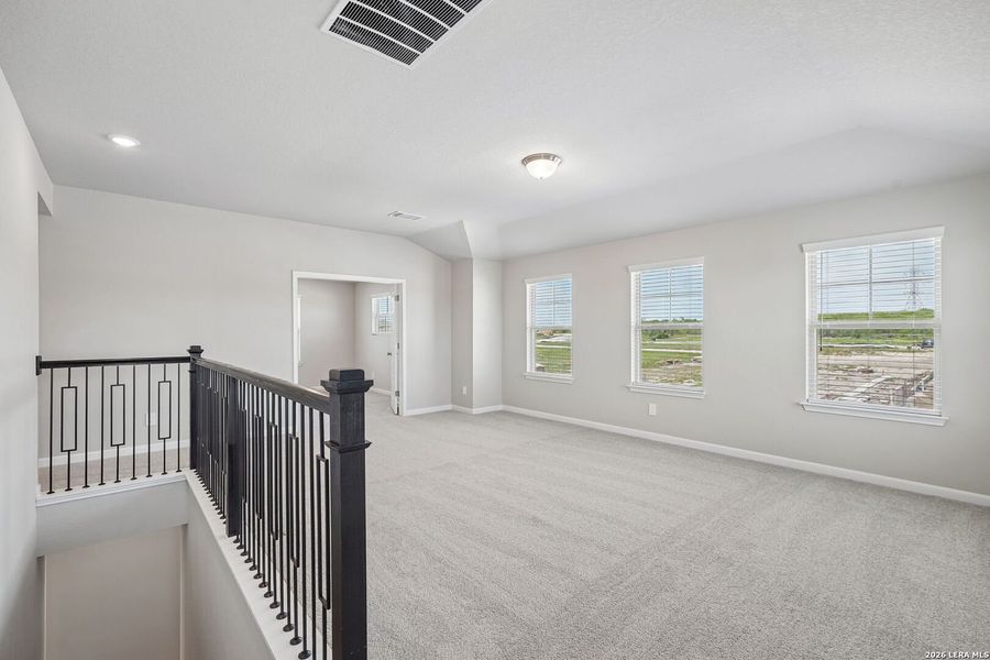 Spacious, unfurnished interior of a new home in Remington Ranch, San Antonio (Image 40).