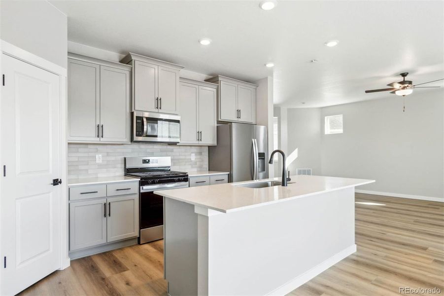 Furnished interior view inside a new home in Second Creek Farm, Commerce City (Image 6).