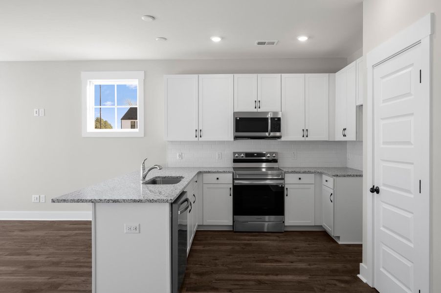 Photo is of a similar home