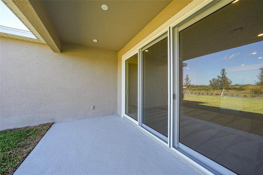Exterior details and patio area of a home in Turnleaf, Punta Gorda (Image 4).