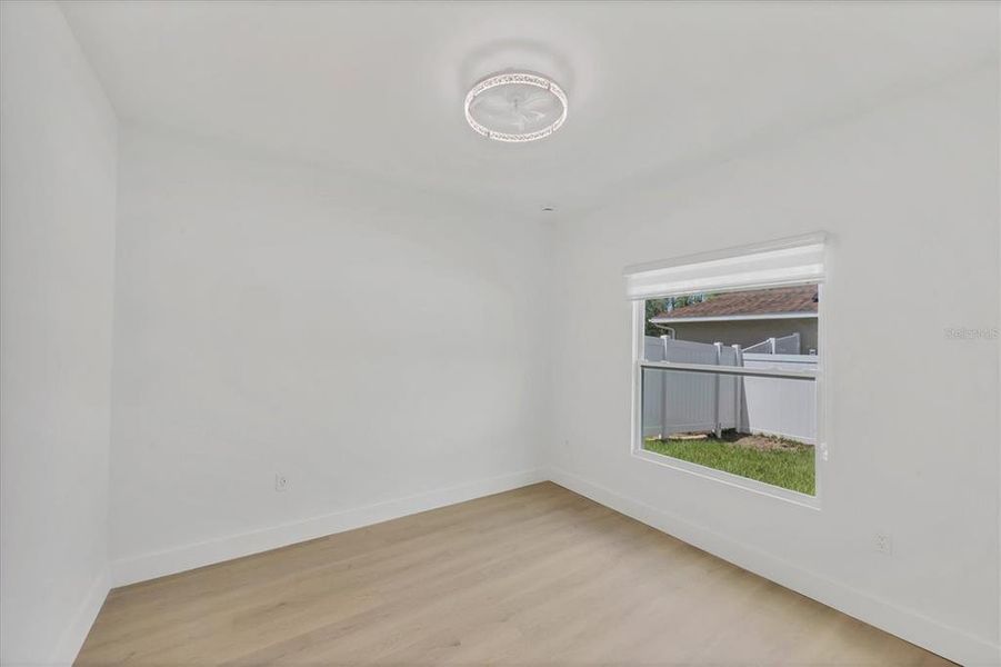 Spacious, unfurnished interior of a new home in , Port Charlotte (Image 33).