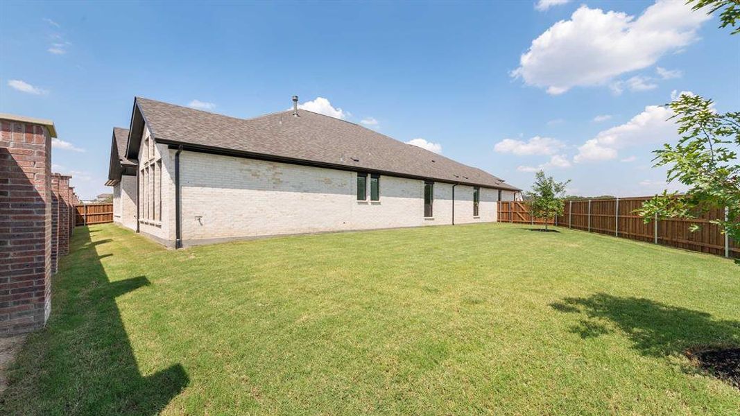 Front exterior of a new home in Adkins Park 70', Hurst, TX, highlighting curb appeal (Image 1).