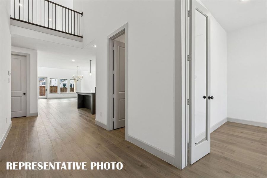 You'll enjoy greeting friends and family in this grand, light filled entry offering sight lines from the front through to the back of the home!  REPRESENTATIVE PHOTO