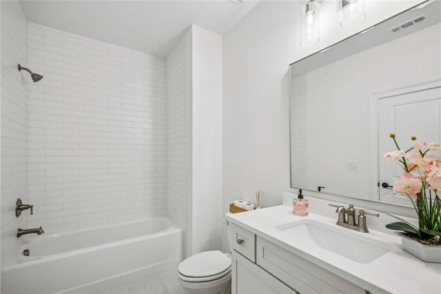 Furnished interior view inside a new home in The Enclave on Lavista, Tucker (Image 28).