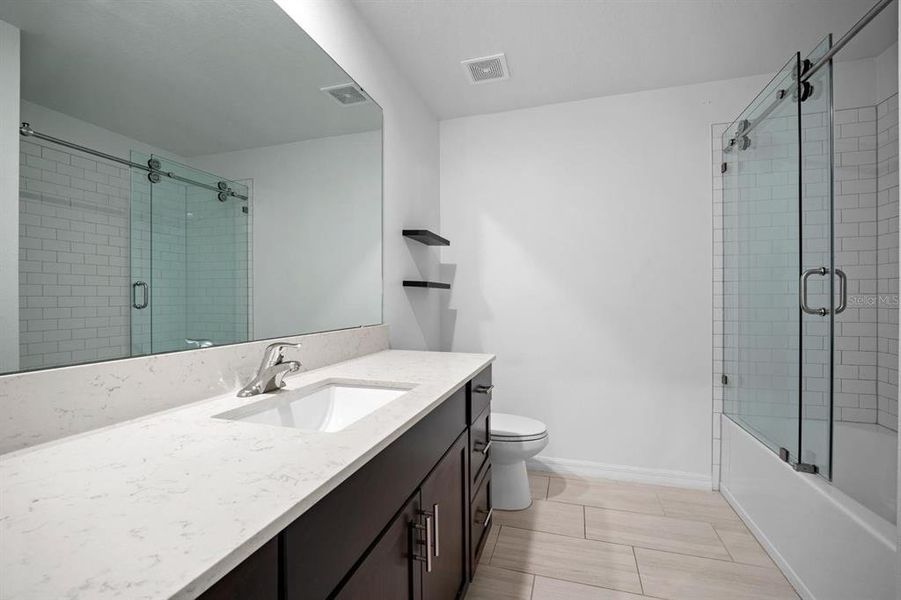 Furnished interior view inside a new home in North Park Isle, Plant City (Image 13).