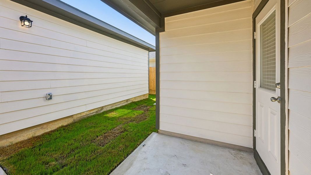 Exterior details and patio area of a home in Valverde, Bastrop (Image 20).