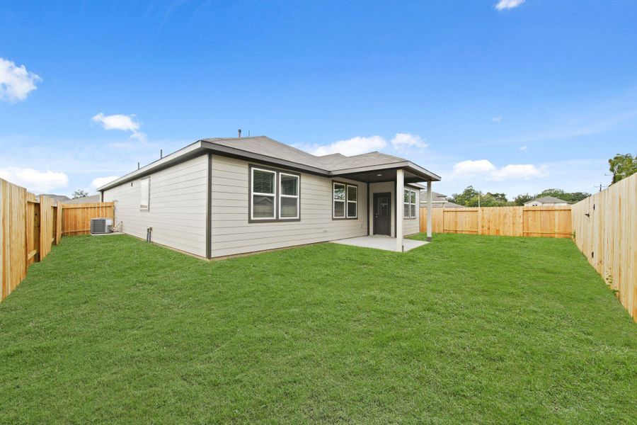 Exterior details and patio area of a home in Russell Ranch, Bay City (Image 4).