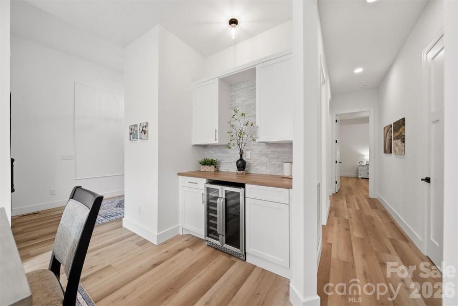 Extra cabinets, drink fridge, this space can be used for whatever your needs may be.