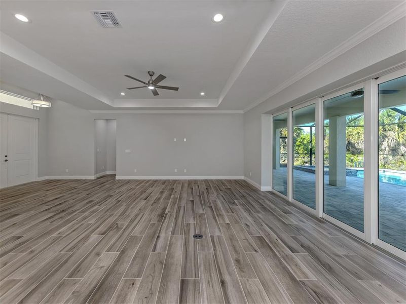 Spacious, unfurnished interior of a new home in , Port Charlotte (Image 31).