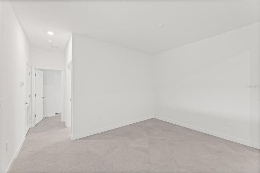 Spacious, unfurnished interior of a new home in Calusa Country Club, Lakewood Ranch (Image 29). Spacious, unfurnished interior of a new home in Calusa Country Club, Lakewood Ranch (Image 29).