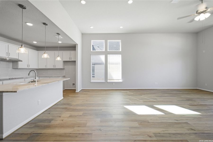 Spacious, unfurnished interior of a new home in The Woodlands at Medina Hills, Mico (Image 16).