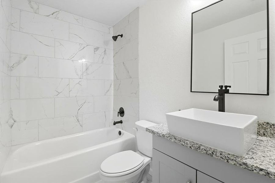 Furnished interior view inside a new home in , Dunnellon (Image 13).