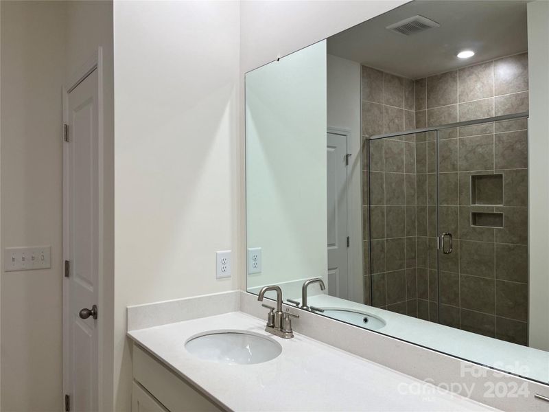 Primary bath with dual vanities & stand up shower