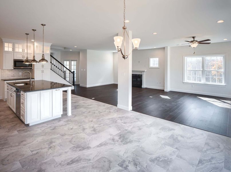 Chef's Kitchen, Breakfast Area, Family Room, and Sunroom