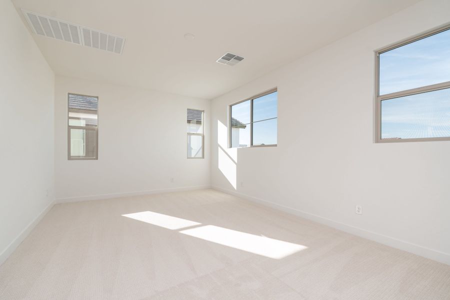 Spacious, unfurnished interior of a new home in Waterston Central, Gilbert (Image 14).