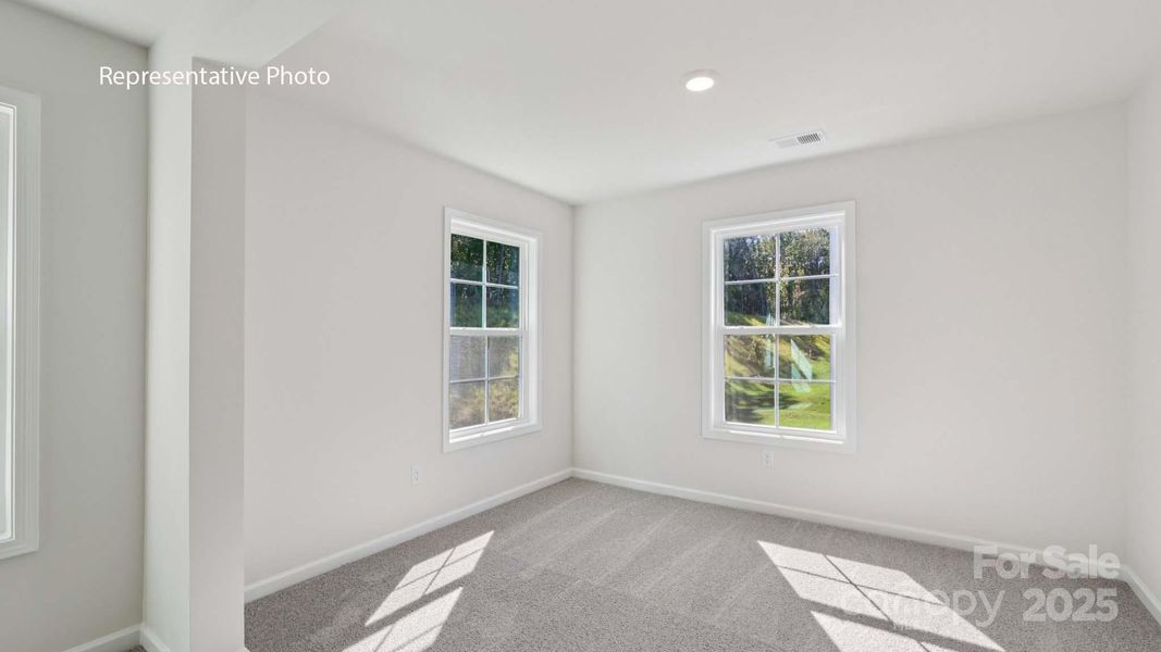 Spacious, unfurnished interior of a new home in Sanctuary at Southgate, Indian Trail (Image 18).