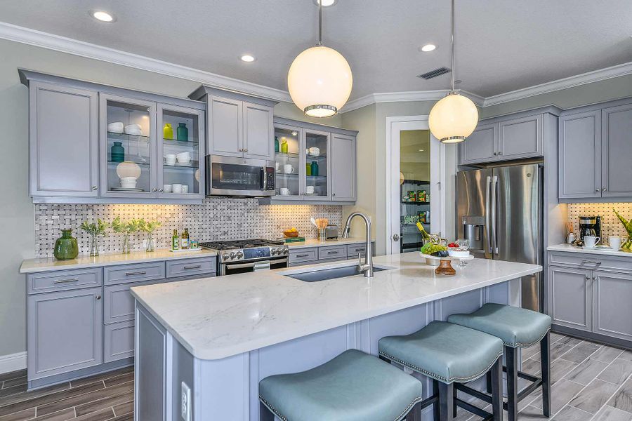 Furnished interior view inside a new home in Boca Royale Golf & Country Club at Wellen Park, Englewood (Image 16).