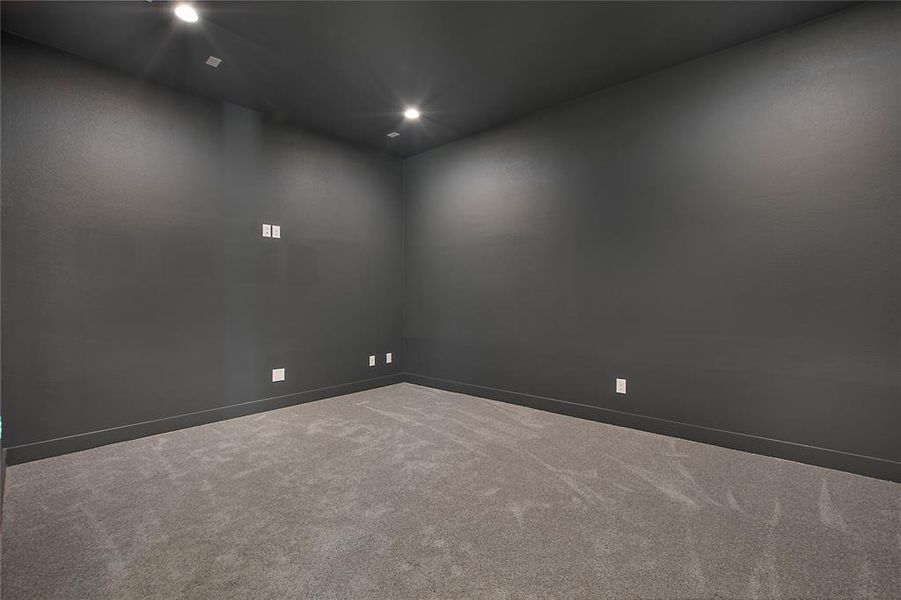 Empty room with carpet floors