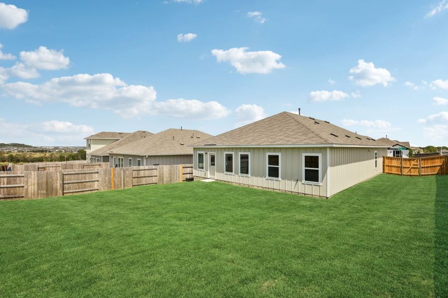 Exterior details and patio area of a home in Cloverleaf, Austin (Image 3).