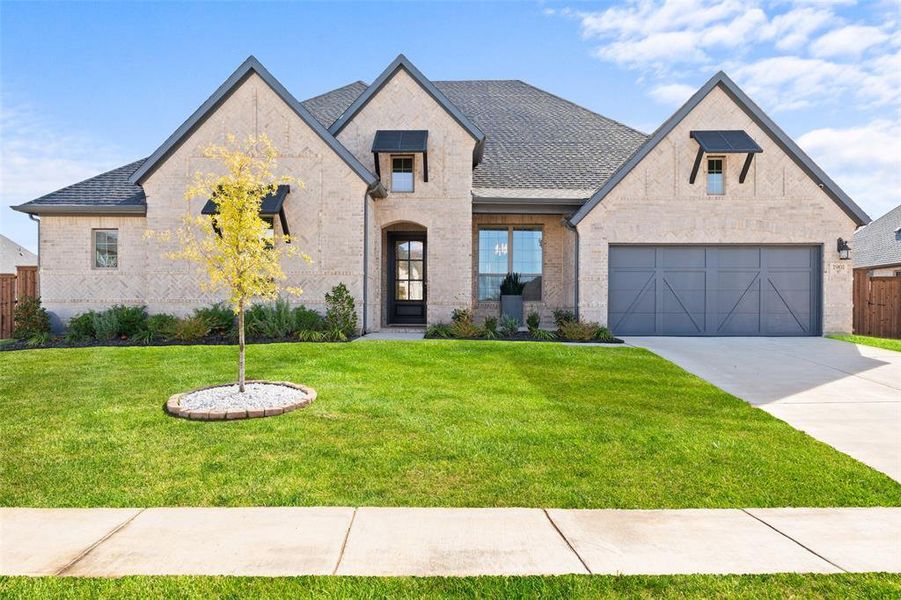 Front exterior of a new home in , Mansfield, TX, highlighting curb appeal (Image 21). Front exterior of a new home in , Mansfield, TX, highlighting curb appeal (Image 21).