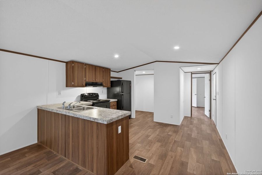 Furnished interior view inside a new home in , Bandera (Image 7).