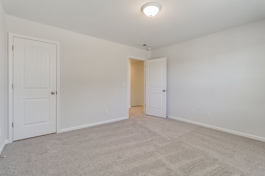 Spacious, unfurnished interior of a new home in The Falls, Blythewood (Image 29).