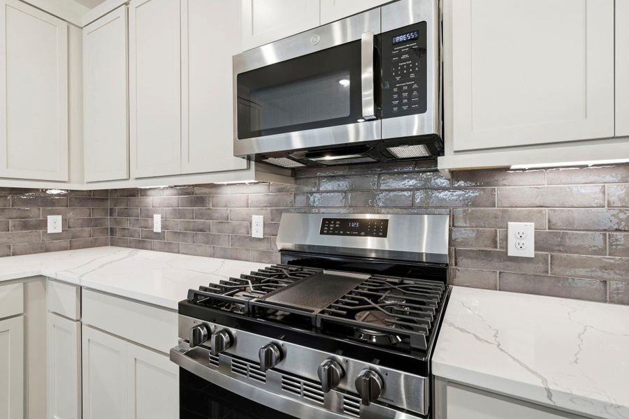 Furnished interior view inside a new home in Meridiana, Manvel (Image 9).