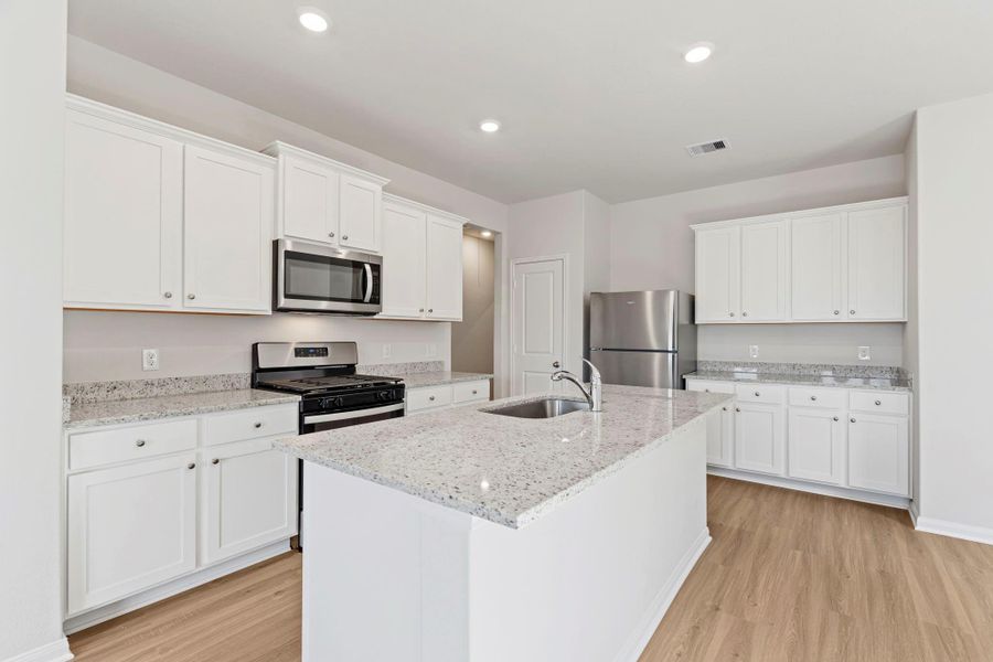 Furnished interior view inside a new home in Canterra Creek, Arcola (Image 3).