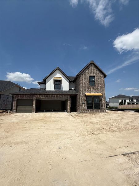 The best-selling Maverick plan by Newmark Homes with a bonus 3rd car garage! Located on a HUGE corner lot. This house will be ready in September!
