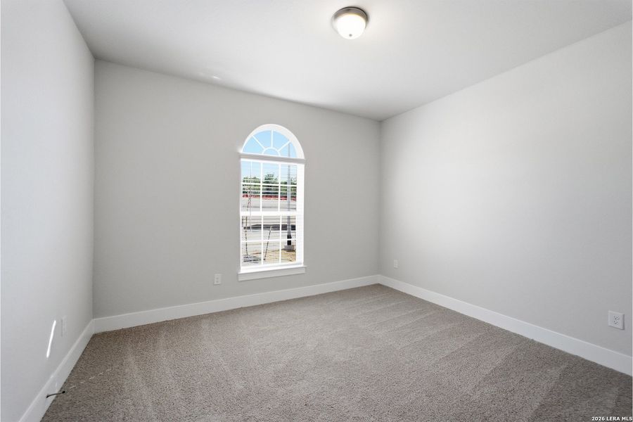 Spacious, unfurnished interior of a new home in The Woodlands at Medina Hills, Mico (Image 27).