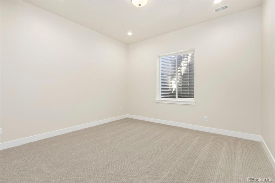 Spacious, unfurnished interior of a new home in Acadia at RainDance, Windsor (Image 10).