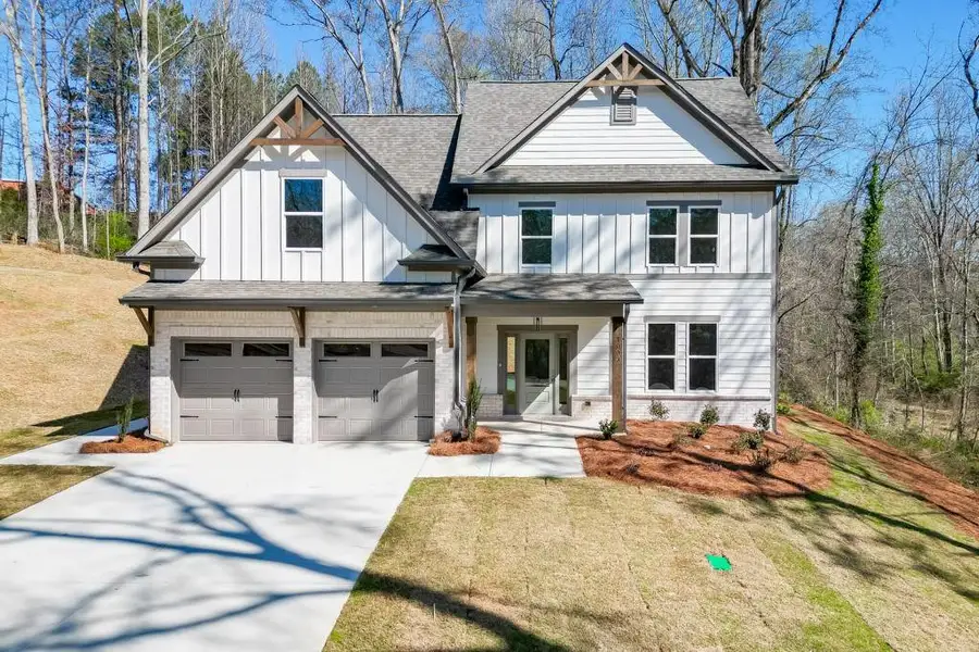 Front exterior of a new home in , Commerce, GA, highlighting curb appeal (Image 23).