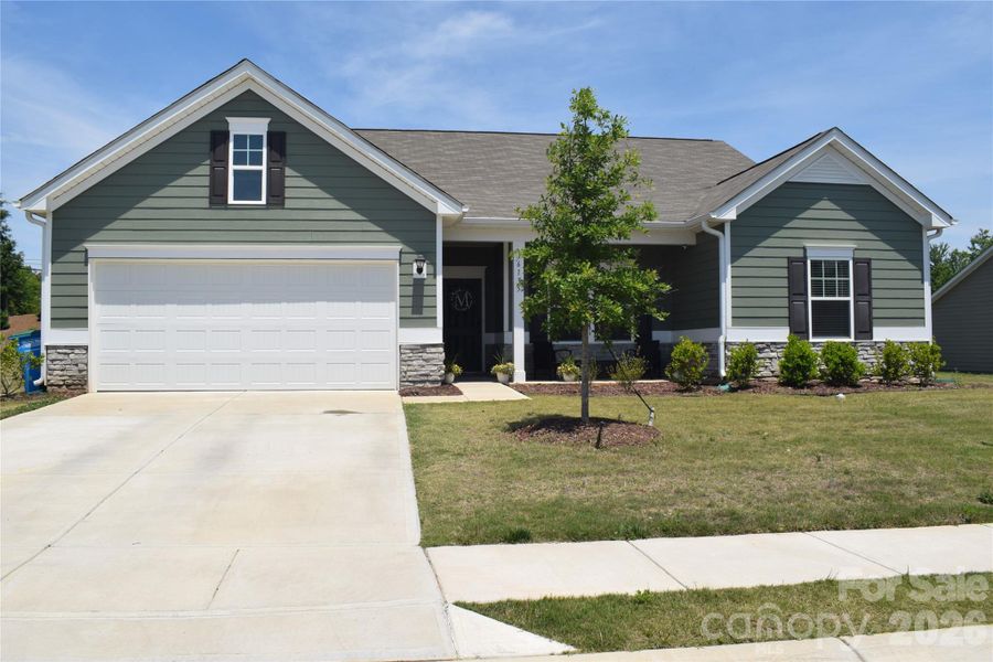 Front exterior of a new home in , Midland, NC, highlighting curb appeal (Image 1). Front exterior of a new home in , Midland, NC, highlighting curb appeal (Image 1).