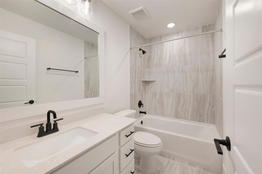 Furnished interior view inside a new home in Lone Star Landing, Montgomery (Image 20).