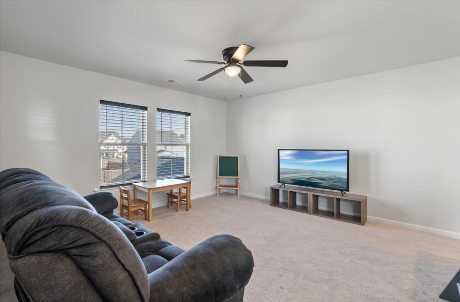 Furnished interior view inside a new home in Sweetgrass at Summers Corner, Summerville (Image 37).