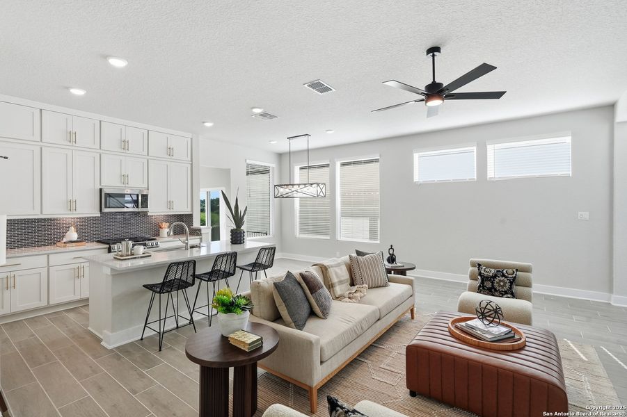 Furnished interior view inside a new home in Centero at Stone Oak, San Antonio (Image 5). Furnished interior view inside a new home in Centero at Stone Oak, San Antonio (Image 5).