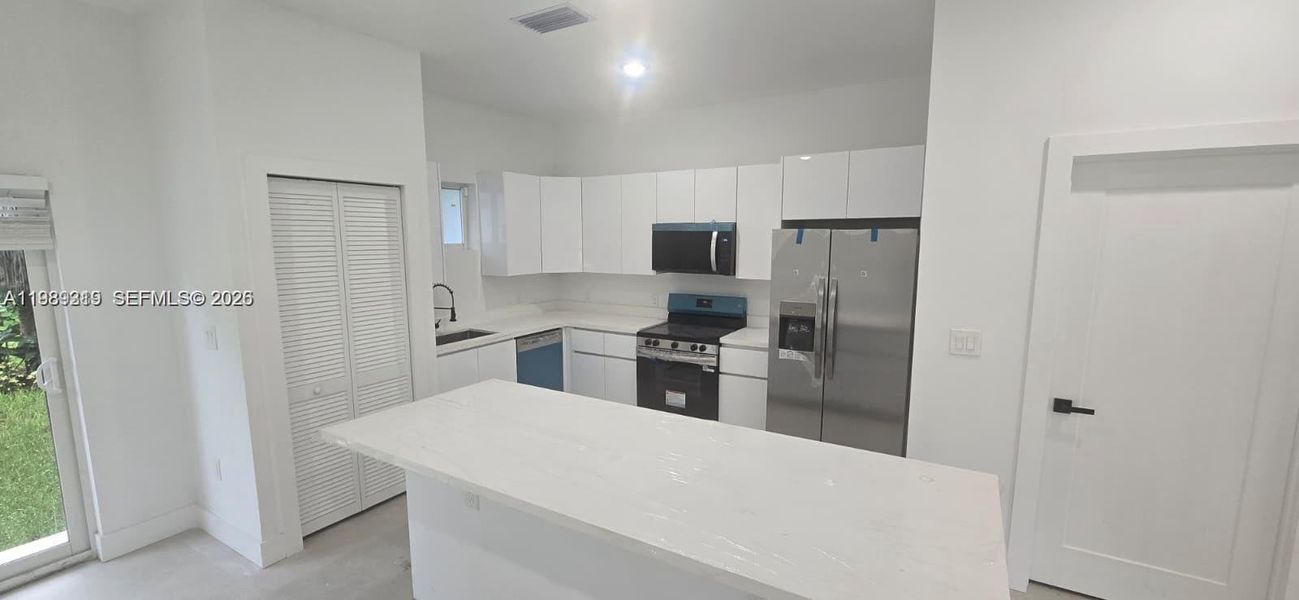 Furnished interior view inside a new home in , Pompano Beach (Image 4).