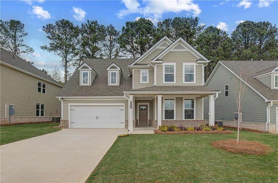 Front exterior of a new home in Cooper Park, McDonough, GA, highlighting curb appeal (Image 17).