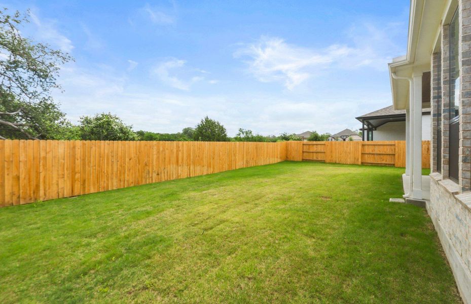 Exterior details and patio area of a home in 6 Creeks, Kyle (Image 22).