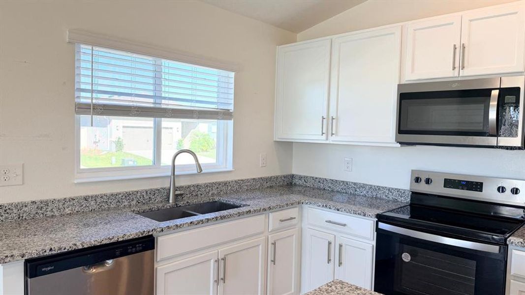 Furnished interior view inside a new home in Lake Lucerne, Winter Haven (Image 7).