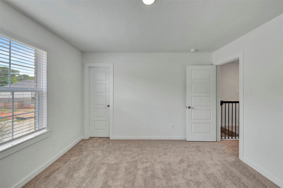 Spacious, unfurnished interior of a new home in Sorella, Tomball (Image 27).