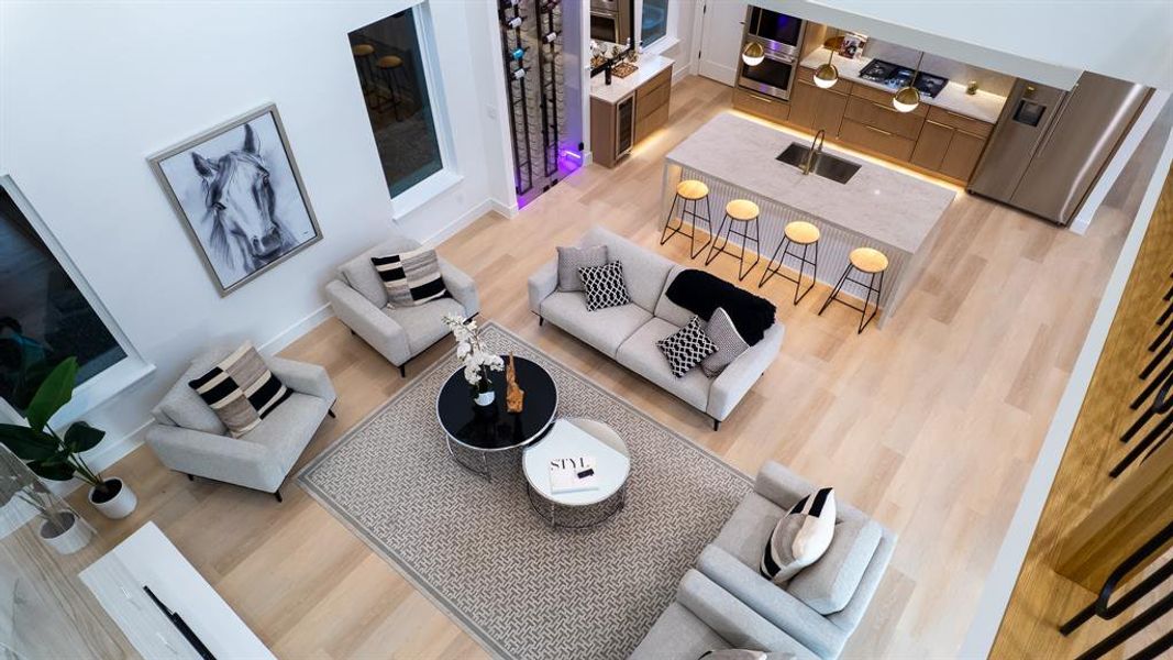 Living room with light wood-style flooring