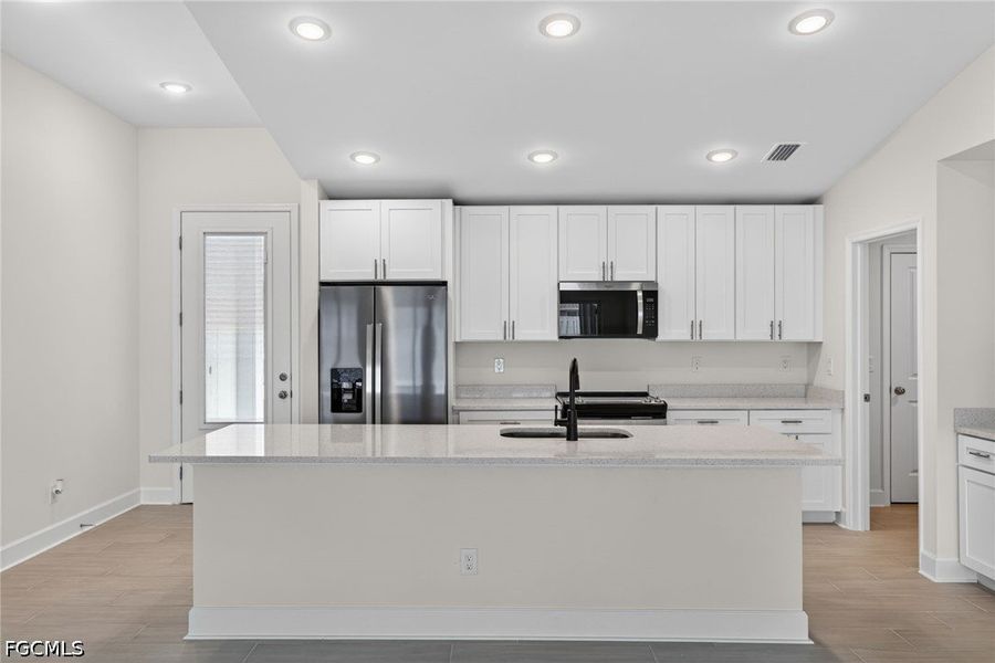 Furnished interior view inside a new home in Cape Coral, Cape Coral (Image 10).