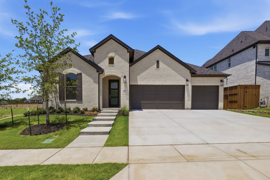 Front exterior of a new home in Custer Ridge Estates, Allen, TX, highlighting curb appeal (Image 1). Front exterior of a new home in Custer Ridge Estates, Allen, TX, highlighting curb appeal (Image 1).